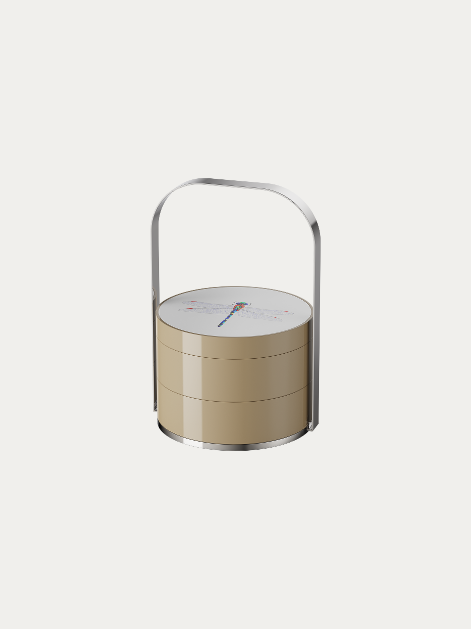 Dragonfly khaki double-layer lidded carry storage box official shot on plain off-white background, rounded stacked cylindrical shape, soft low-saturation khaki matte lacquer body, delicate hand-drawn dragonfly illustration on white lid, integrated curved polished stainless steel handle