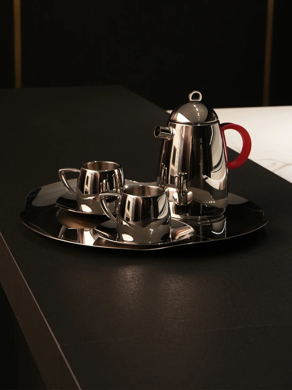 Light luxury Chinese tea layout shot of HD S handled tray matched with stainless teapot & double cups on dark matte countertop
