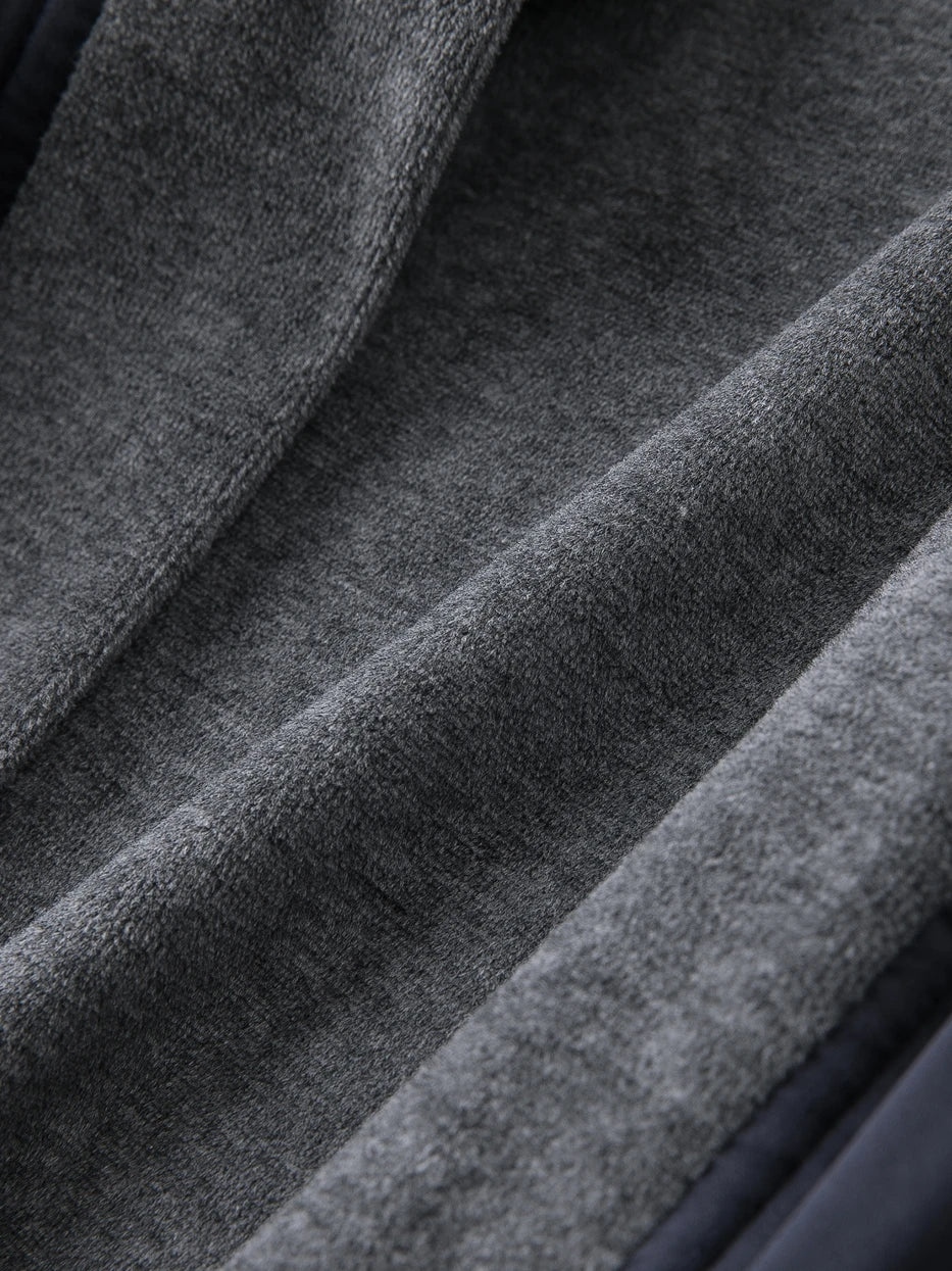 Macro close-up of 100% cotton grey terry inner lining of HERA bathrobe, dense thick terry knit texture, clearly shows water-absorbent soft touch of pure cotton, highlights skin-friendly quick-dry performance of inner fabric