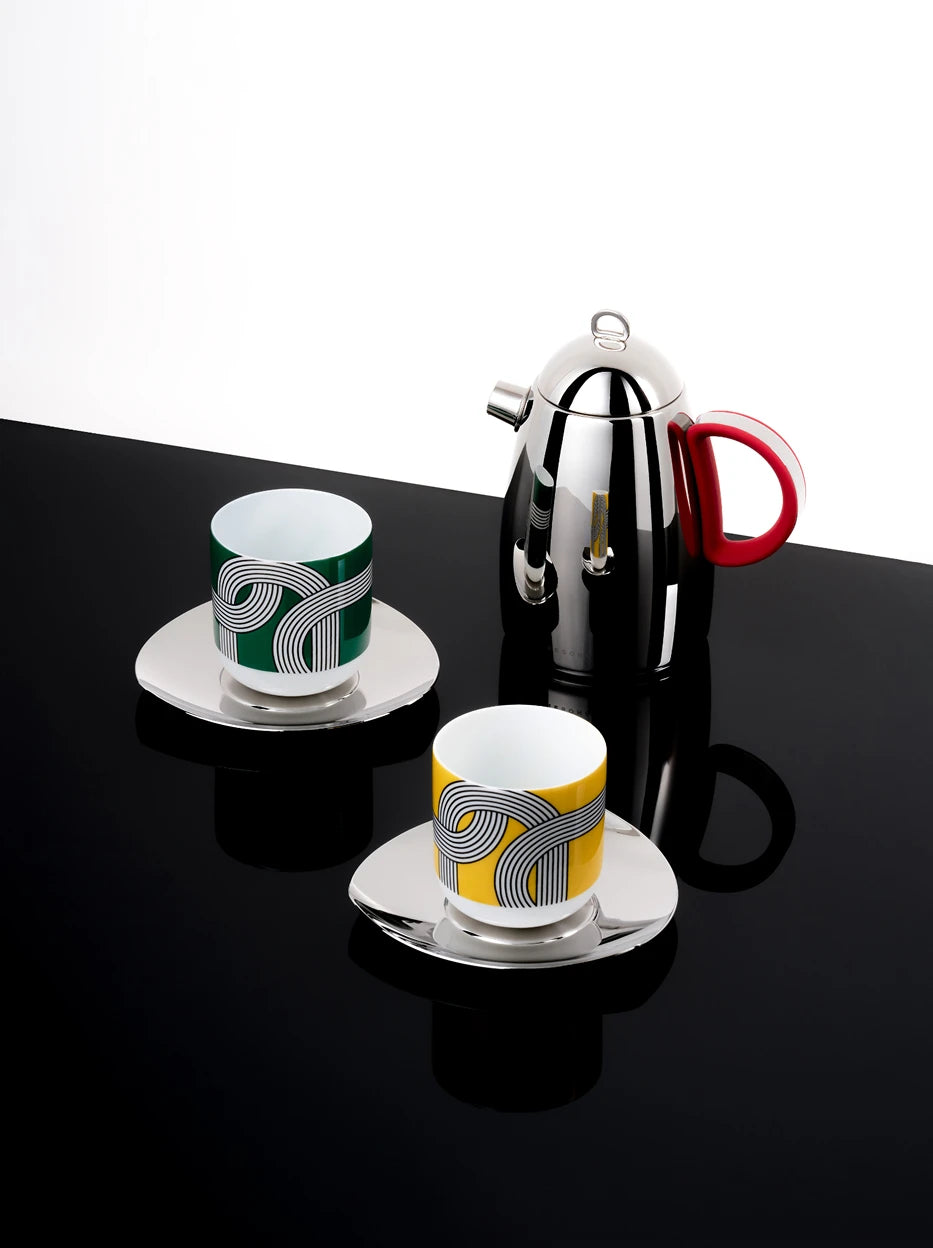 Minimal luxury studio display of complete ALK geometric print drinkware set, reflective black glossy tabletop showing full mirror reflection of pot and two ceramic cups