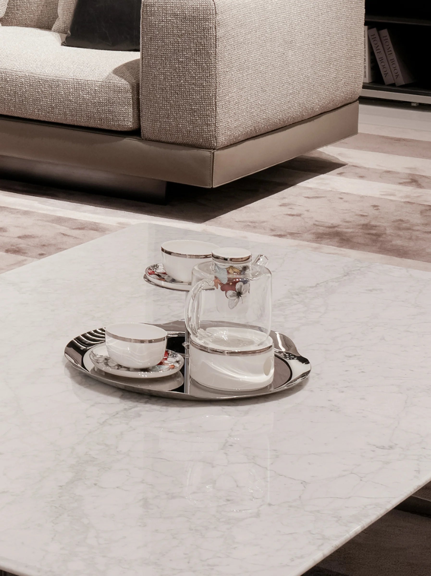 Close-up of the RESONG HOME BUTTERFLY WHISPER Teapot Collection with the HD Stainless Steel Collection tray and POP Collection porcelain cups, showcasing refined craftsmanship for modern tea rituals.