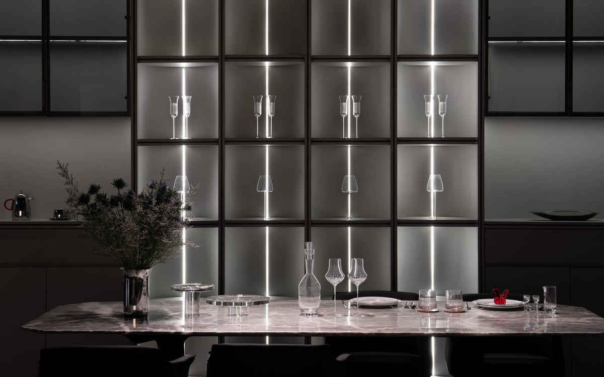 RESONG HOME modern dining room featuring the STARLIGHT Crystal Collection, SHEDI Double-Wall Vase and HD Stainless Steel Collection, creating an elegant contemporary dining experience.