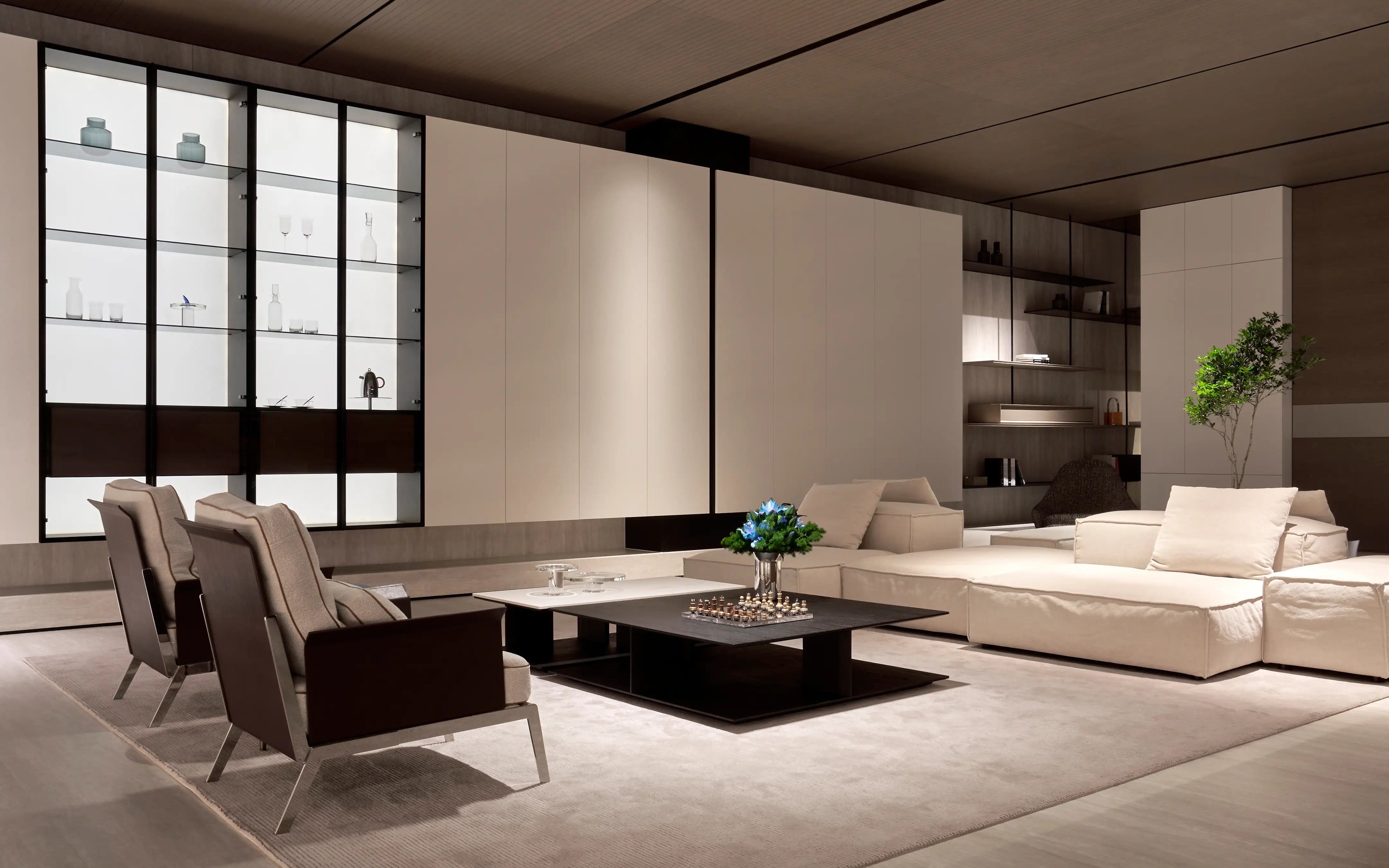 Contemporary luxury living room styled with the RESONG HOME XUYU hand-cut crystal whiskey collection, SHEDI Double-Wall Vase, TORY crystal chess set, STARLIGHT crystal fruit bowl, KELUO drinkware, and BUTTERFLY decorative accessories.