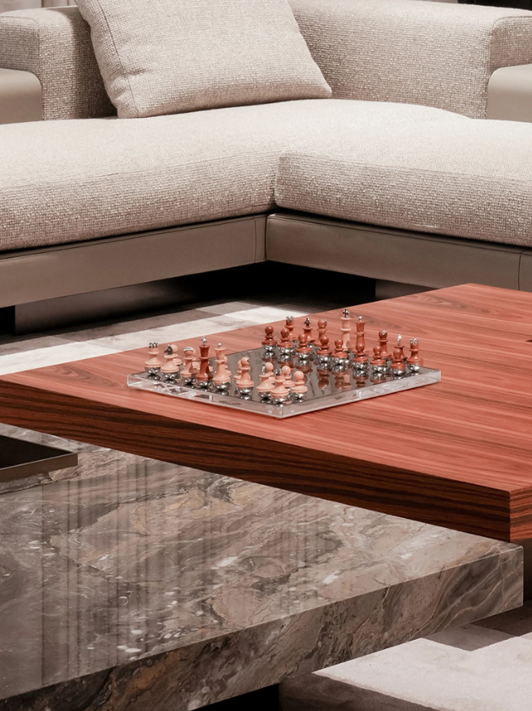 RESONG HOME TORY International Chess displayed on a luxury coffee table, combining sculptural chess pieces with premium materials for a sophisticated modern living space.