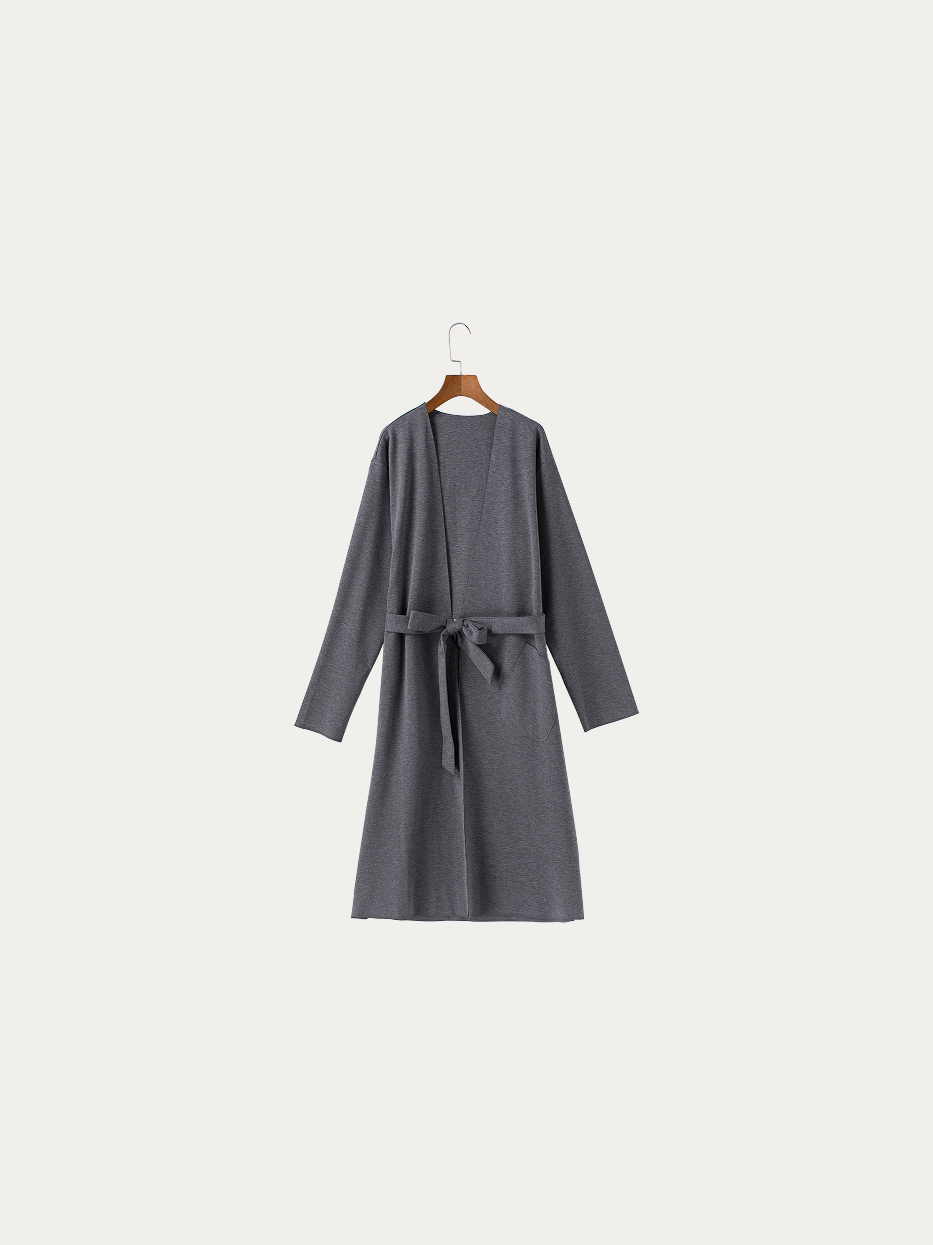 Official hanging product shot of MAYA dark gray stretch silk cotton bathrobe size L on pure off-white background, solid heather gray textured knit fabric, kimono V-collar, matching fabric wide waist tie, side patch pocket, all-in-one single-layer skin-friendly home bathrobe