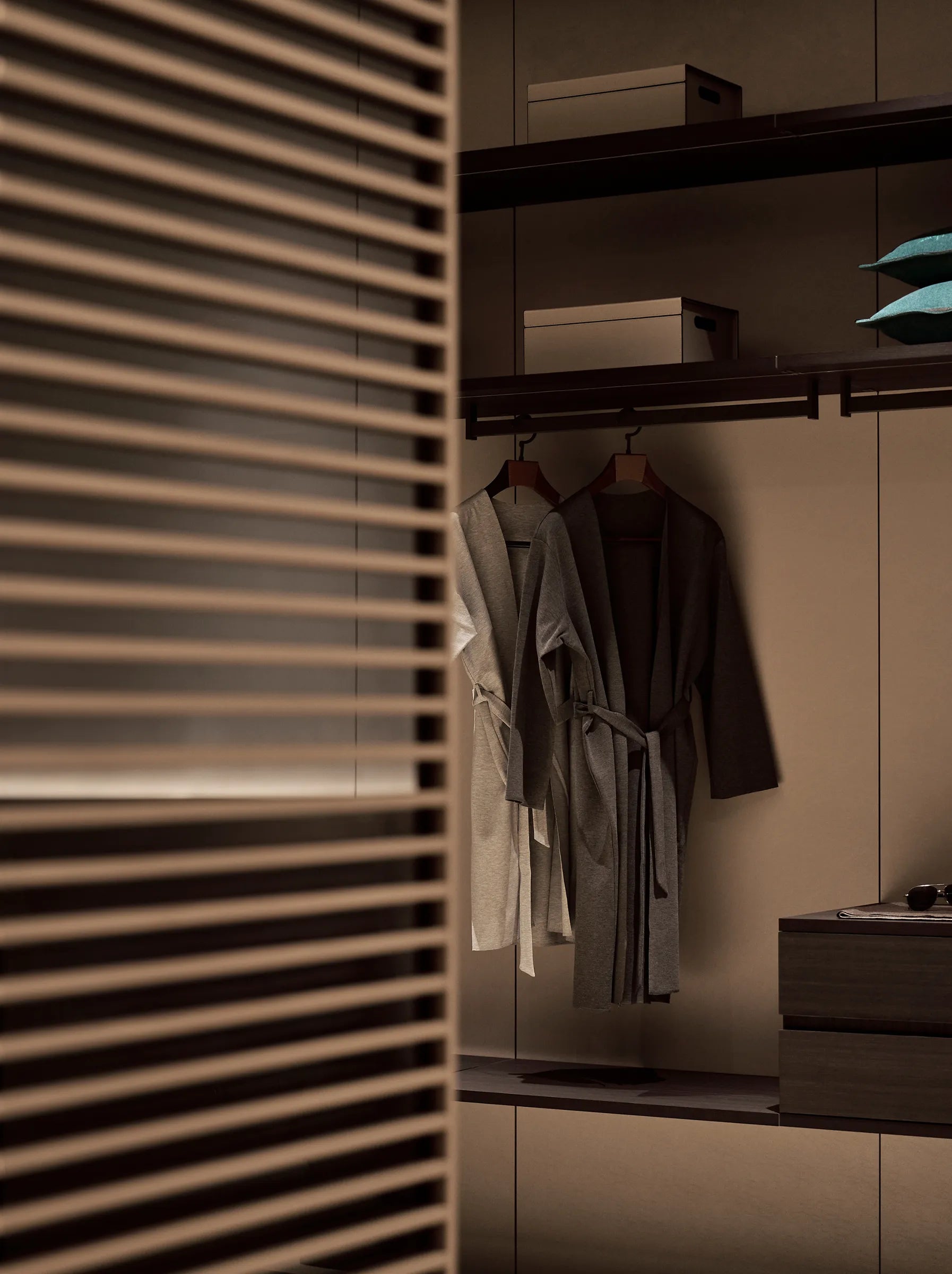RESONG MAYA Bathrobe displayed in a contemporary walk-in closet, creating a sophisticated wardrobe space with premium bath essentials.