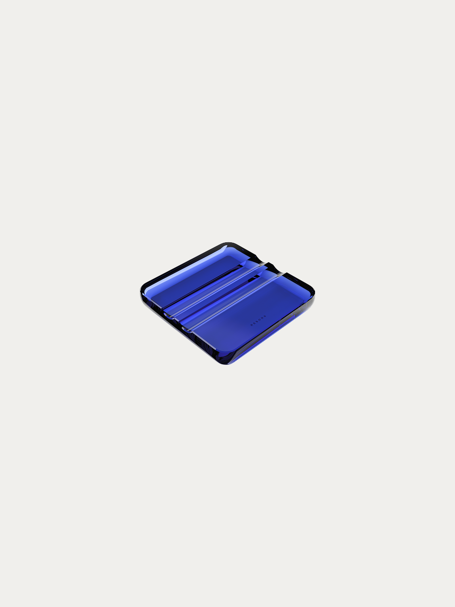 RESONG RUIYING Deep Blue Cigar Holder official shot on plain off-white background, thickened monolithic deep blue crystal integrally cut & polished, double-layer rectangular dual-slot design, soft rounded edges minimalist artistic cigar rest tray