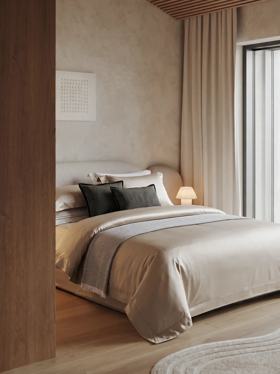Cream wood micro-cement bedroom furnishing full view shot of SHUMIAN champagne gold XL-size silky bedding set matched with wooden ceiling & curved fabric headboard