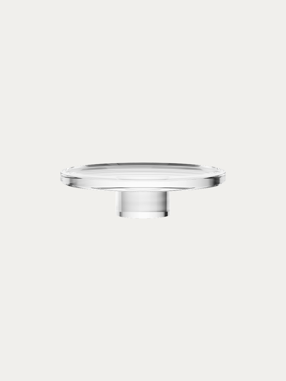 RESONG STARLIGHT Fruit Plate L official shot on plain off-white background, one-piece cast high-transparency crystal glass, widened smooth shallow round tray with thick solid cylindrical tall base, large-capacity minimalist light luxury elevated display stand