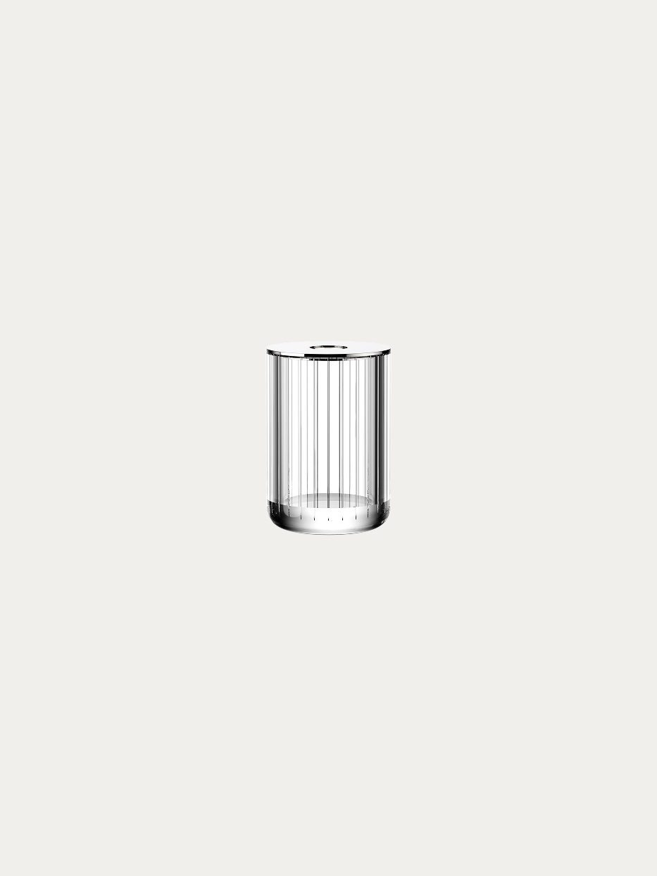 Official product shot of XUYU vertical striped crystal reed diffuser bottle on pure off-white background, cylindrical body with vertical striped transparent crystal, central perforated stainless steel lid, universal home fragrance decorative container, core matching piece of XUYU bathroom set