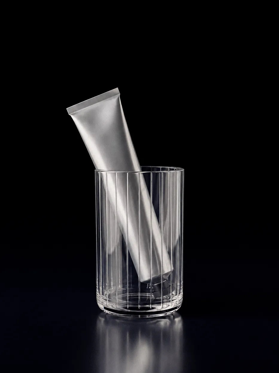 Soft natural light furnishing shot of XUYU crystal cup on white window sill with sheer curtain backdrop