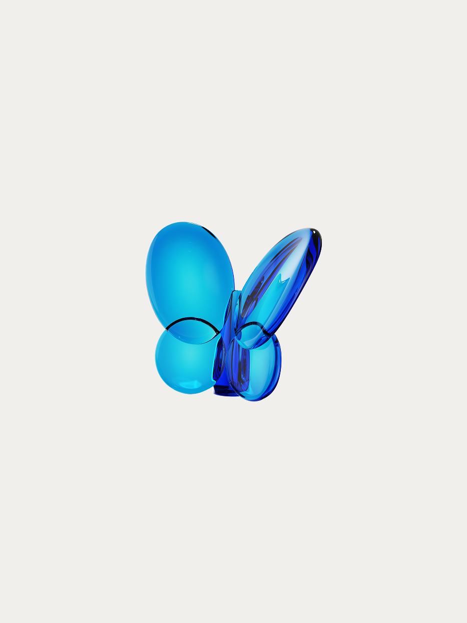 Official product shot of Klein blue crystal butterfly ornament on pure off-white background, integrated smooth rounded butterfly curve, full deep high-saturation Klein blue crystal, all edges hand polished for soft light, color-block artistic decorative ornament