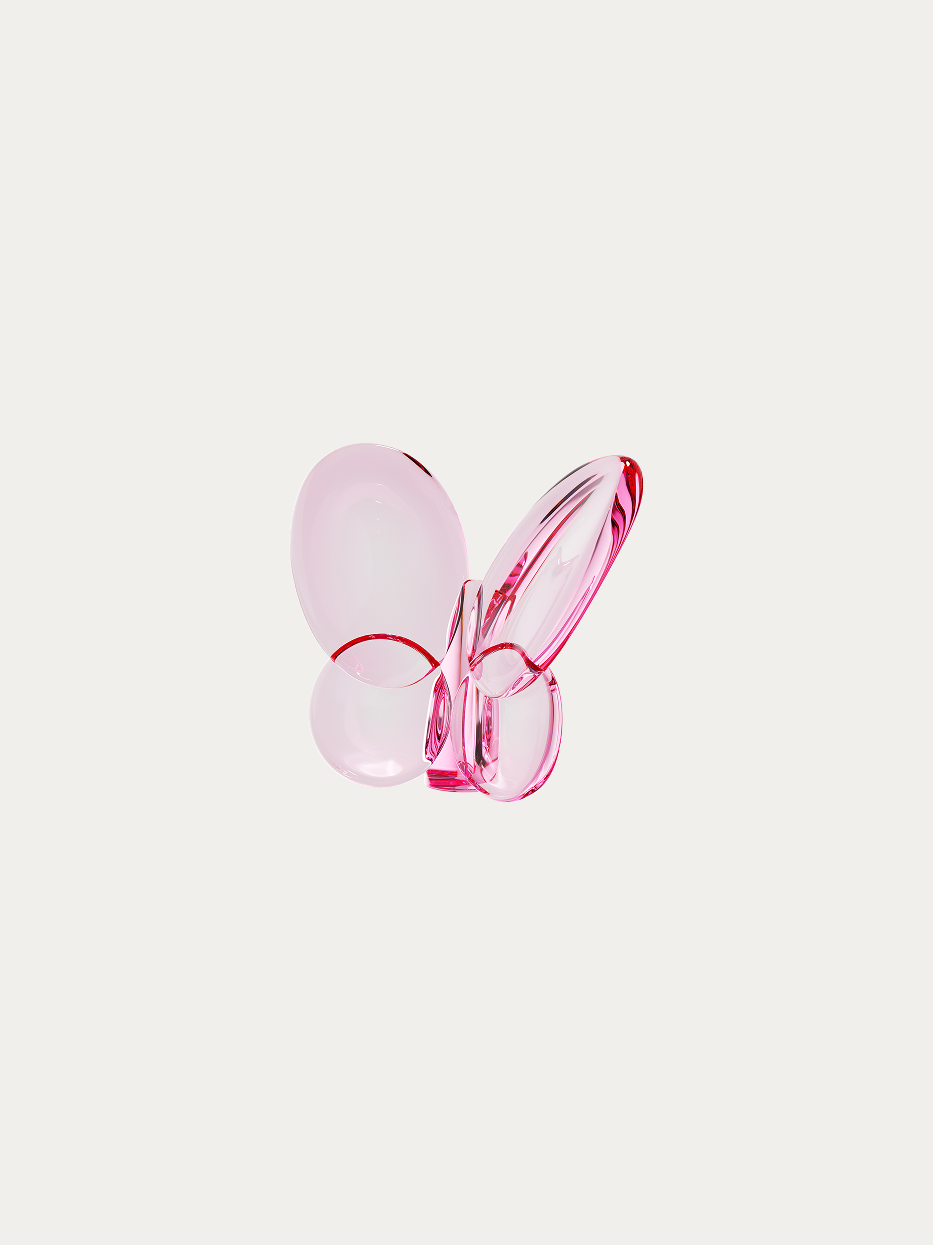 Official product shot of cherry pink crystal butterfly ornament on pure off-white background, integrated soft rounded butterfly curve, gradient light cherry pink transparent crystal, all edges soft hand-polished tender feminine decorative ornament