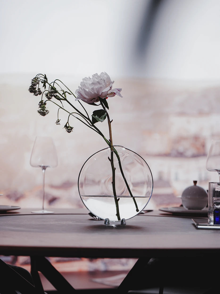 Minimalist dining table furnishing shot of medium Fishmouth vase with white peony matched with wine glasses for banquet layout