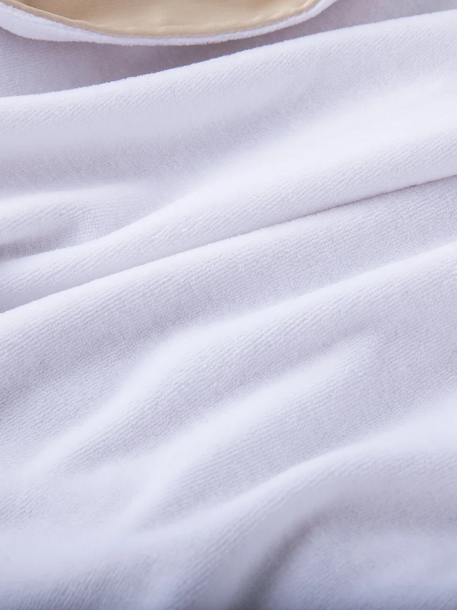 Macro close-up of 100% cotton white terry inner lining of HERA bathrobe, dense thick terry knit texture, clearly shows water-absorbent soft touch of pure cotton, highlights skin-friendly quick-dry performance of inner fabric