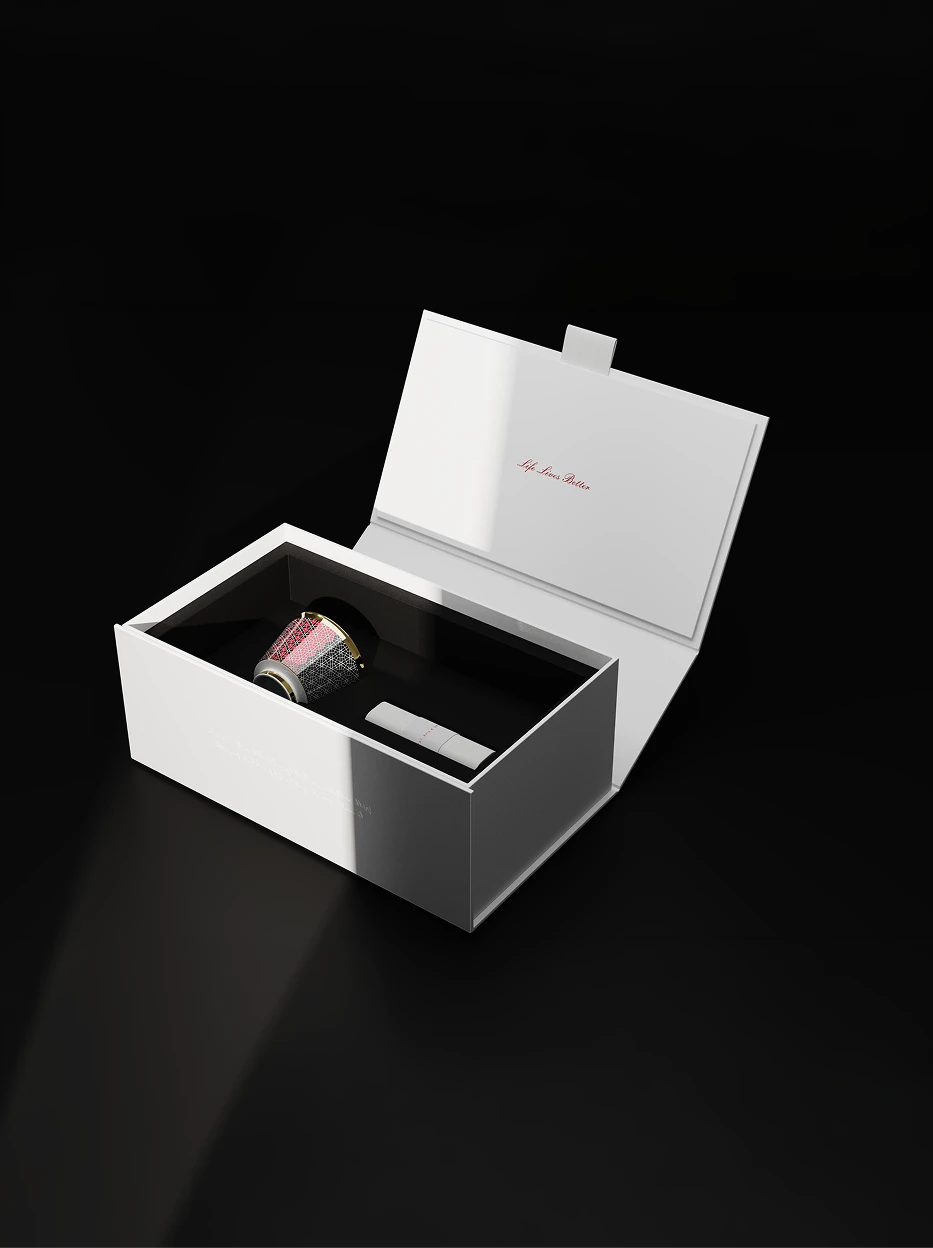 Premium unboxing shot of single GUOYUE Black & Red ceramic cup neatly embedded in black flocking lining of white branded flip gift box, solid pure black minimalist background