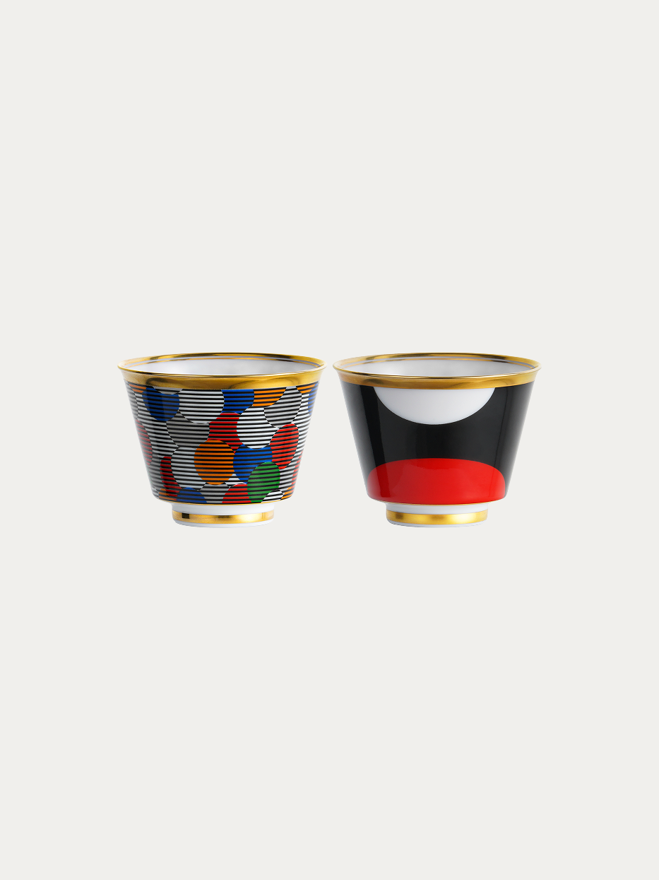 RESONG HOME GUOYUE Ceramic Cup Set (Composition/ Sunrise), two-piece matching set including colorful dot-stripe Composition cup and black-white-red geometric Sunrise cup, double gold trim on rim and base, official product photo on plain off-white background