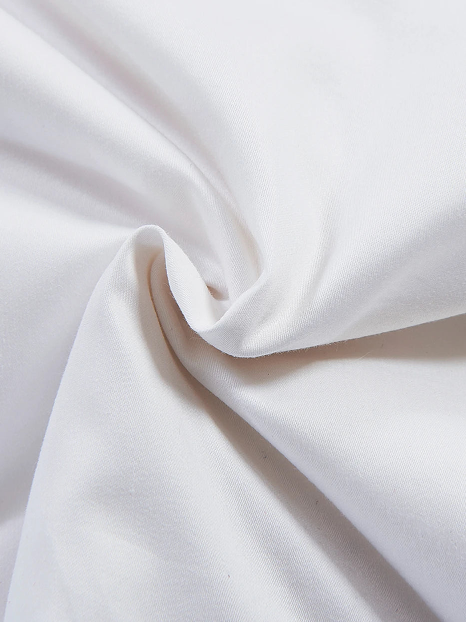 Soft natural light close-up shot of ICELAND winter duvet soft silk outer fabric, showing tight smooth matte texture with fine down-proof weave
