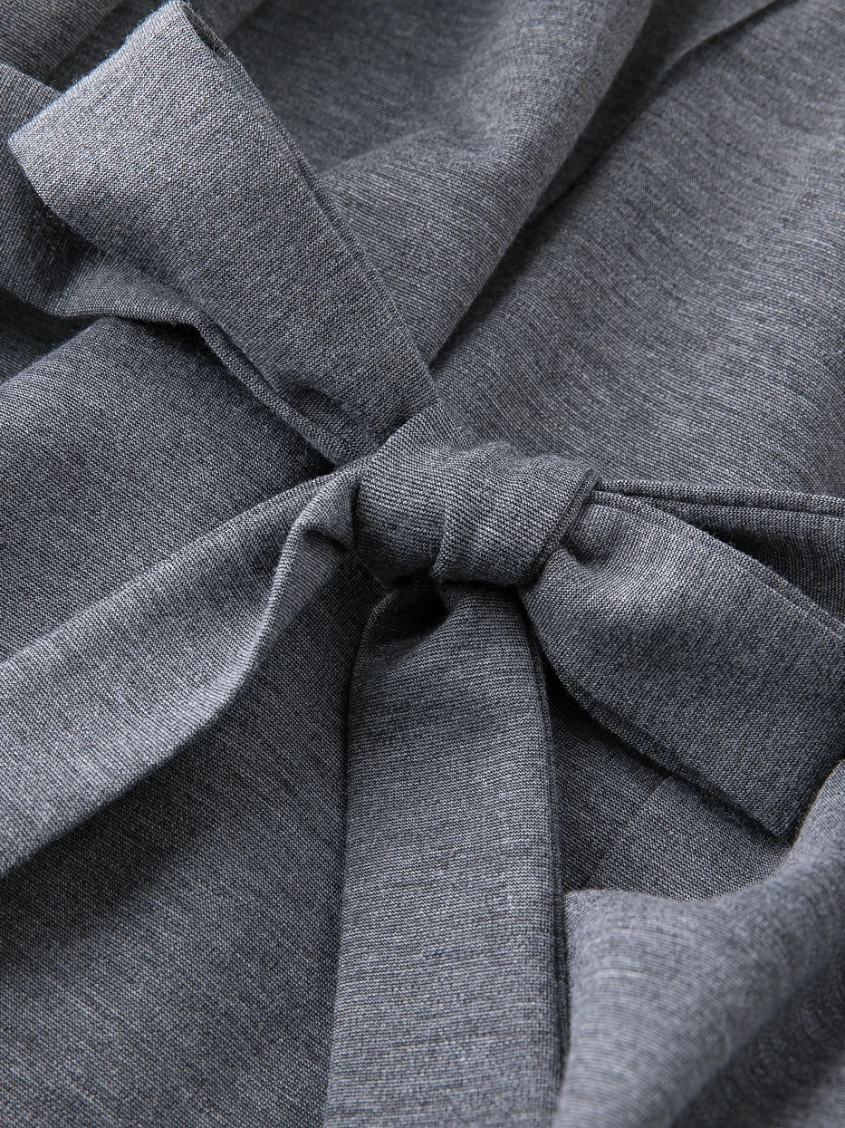 Macro close-up of wide matching fabric waist tie knot of MAYA stretch bathrobe, integrated stretch heather gray knit fabric, tight knot anti-slip design, fully presents fabric stretch draping texture and neat wrapped edge craft
