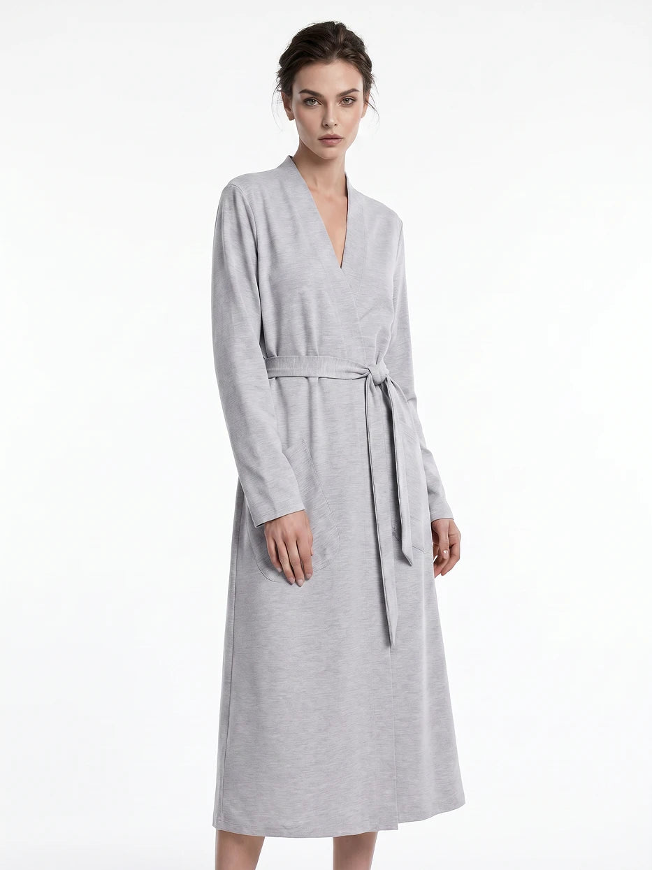 Pure white background full-body front shot of model wearing size M MAYA light gray stretch bathrobe, fully displays smooth kimono open lapel, symmetrical dual side pockets and long draping silhouette, presents complete daily home wearing effect