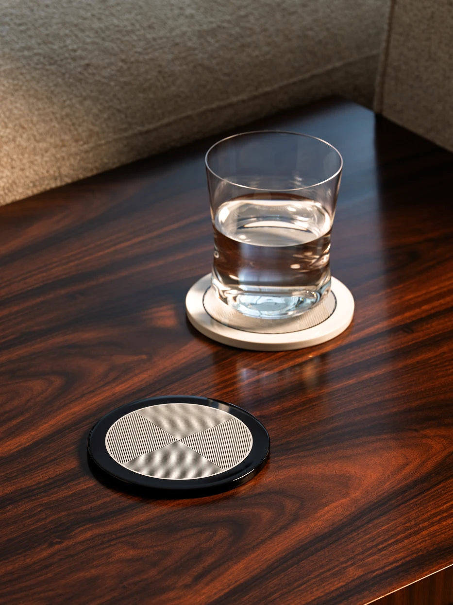 RESONG OPTICAL ART Round Coaster Black handcrafted lacquer coaster with geometric optical art pattern, designed for luxury home bar and modern table setting.