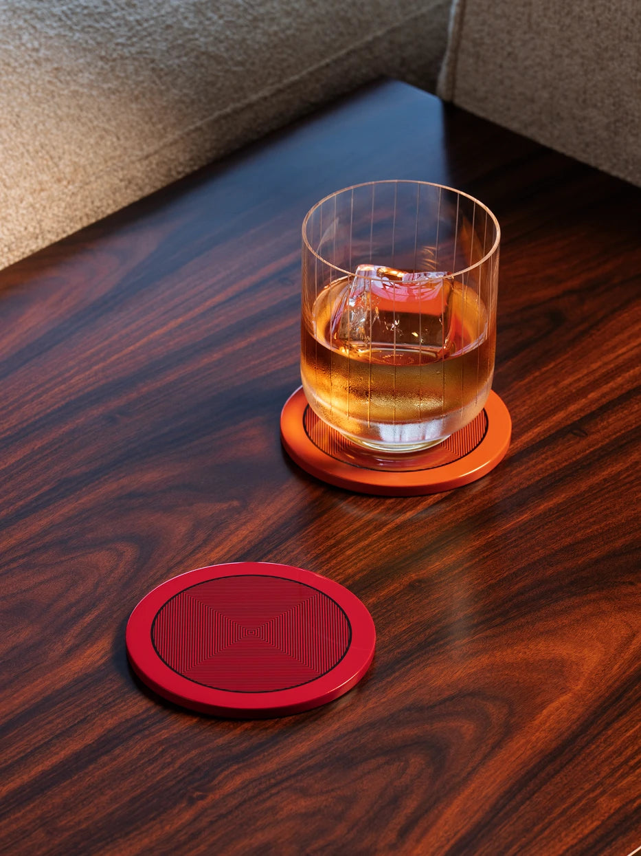 RESONG OPTICAL ART Round Coaster in Red, handcrafted lacquer coaster with geometric optical art pattern designed for luxury whisky serving, coffee table styling and modern home decor.