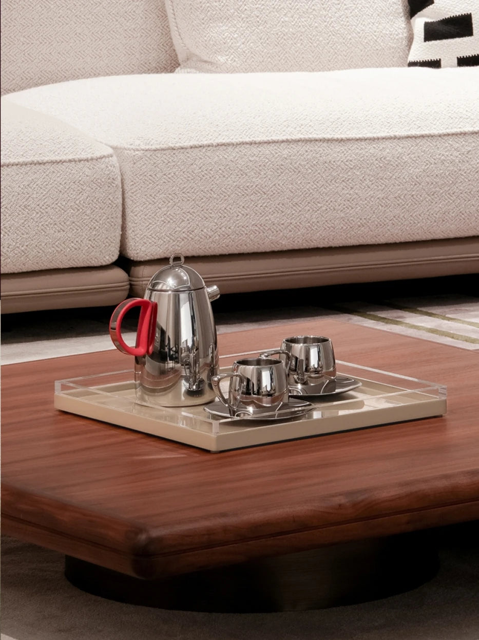 Warm cream living room furnishing shot of khaki PAIS square tray on dark walnut coffee table with stainless steel tea set