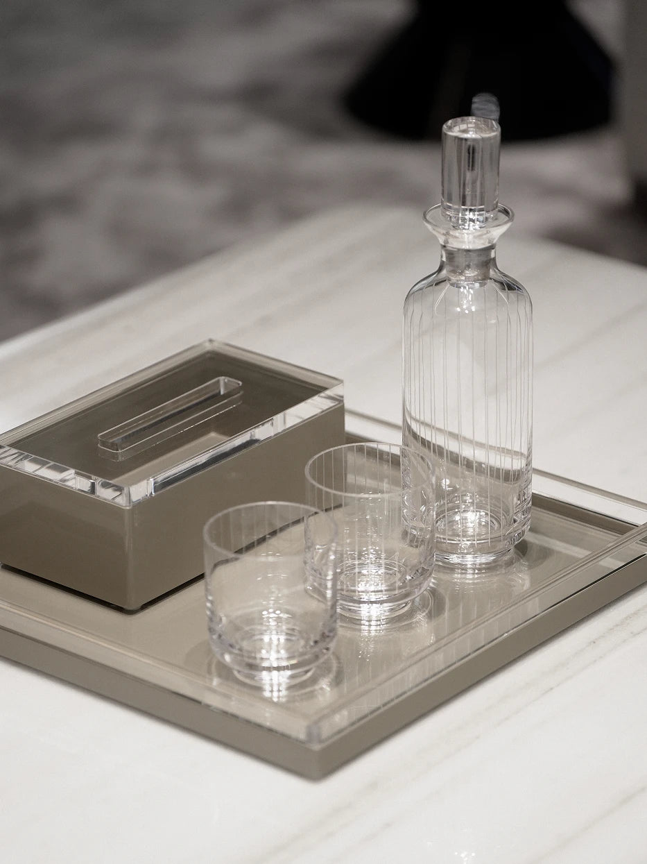 Minimalist tea room furnishing shot of khaki PAIS tissue box on white marble tray matched with vertical striped glass tableware