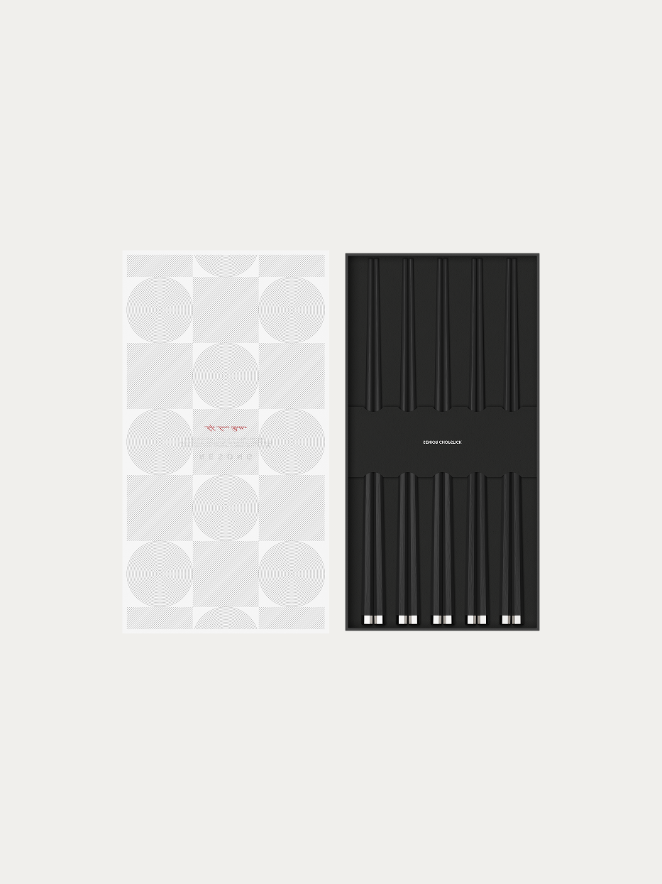 RESONG PAVILION Ebony chopstick 5-pair gift set on plain white background, matte hexagonal ebony chopstick body, hexagonal silver-plated tip embossed with traditional four-leaf scroll pattern, neatly stored in black inner tray with geometric white outer gift box