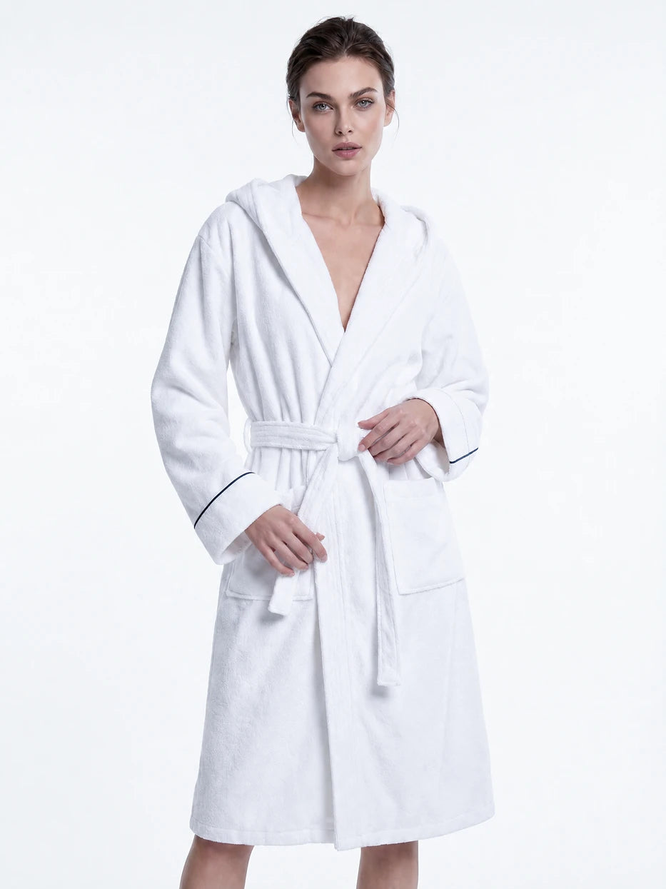 Pure white background full-body front shot of model wearing R Collection white cotton hooded bathrobe, fully displays smooth kimono open lapel, symmetrical dual side pockets, adjustable waist tie and cuff contrast piping design, presents complete daily home wearing effect