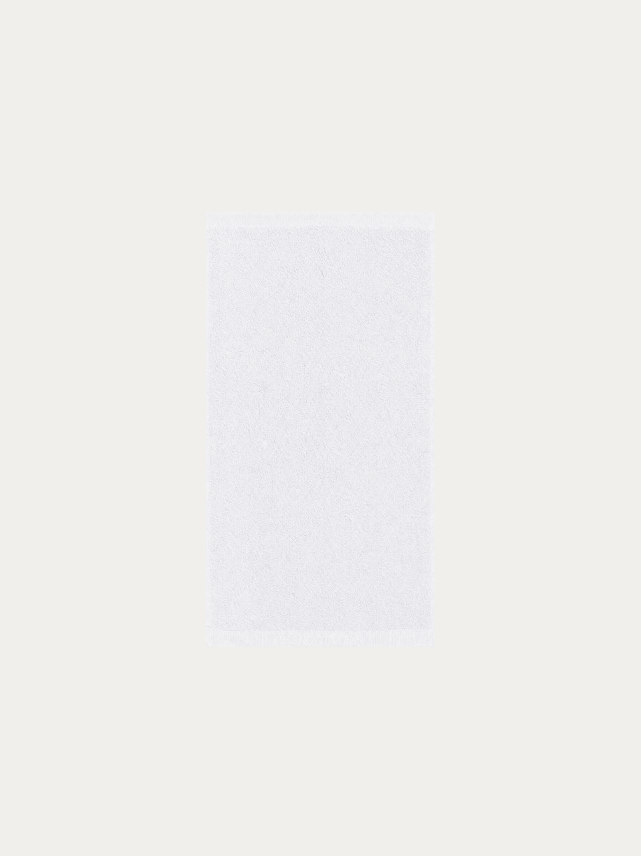 Official flat lay product shot of R Collection white cotton bath towel on pure off-white background, extra large 1400×800mm, 720g heavy dense terry loop, bottom band embroidered with RESONG TOWELS logo, full body wrap water-absorbent large towel for five-star hotel & household use