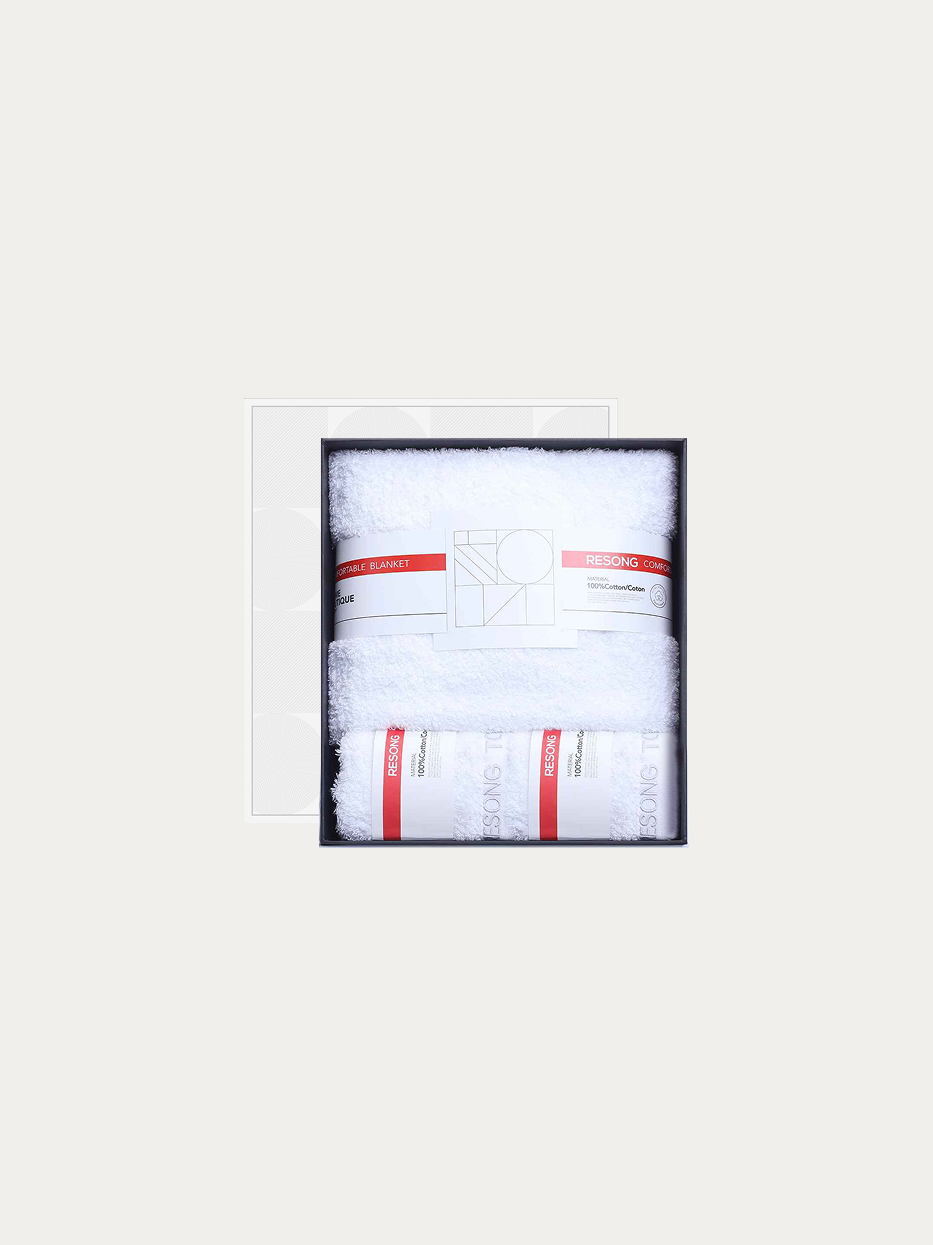 Official window gift box shot of R Series all-white bathroom set (2 face towels + 1 bath towel) on pure off-white background, includes 2 white face towels & 1 oversized full-body bath towel, 100% long-staple cotton heavy dense terry, minimalist red-white brand waist band, premium universal gift set for five-star hotel, wedding & maternity