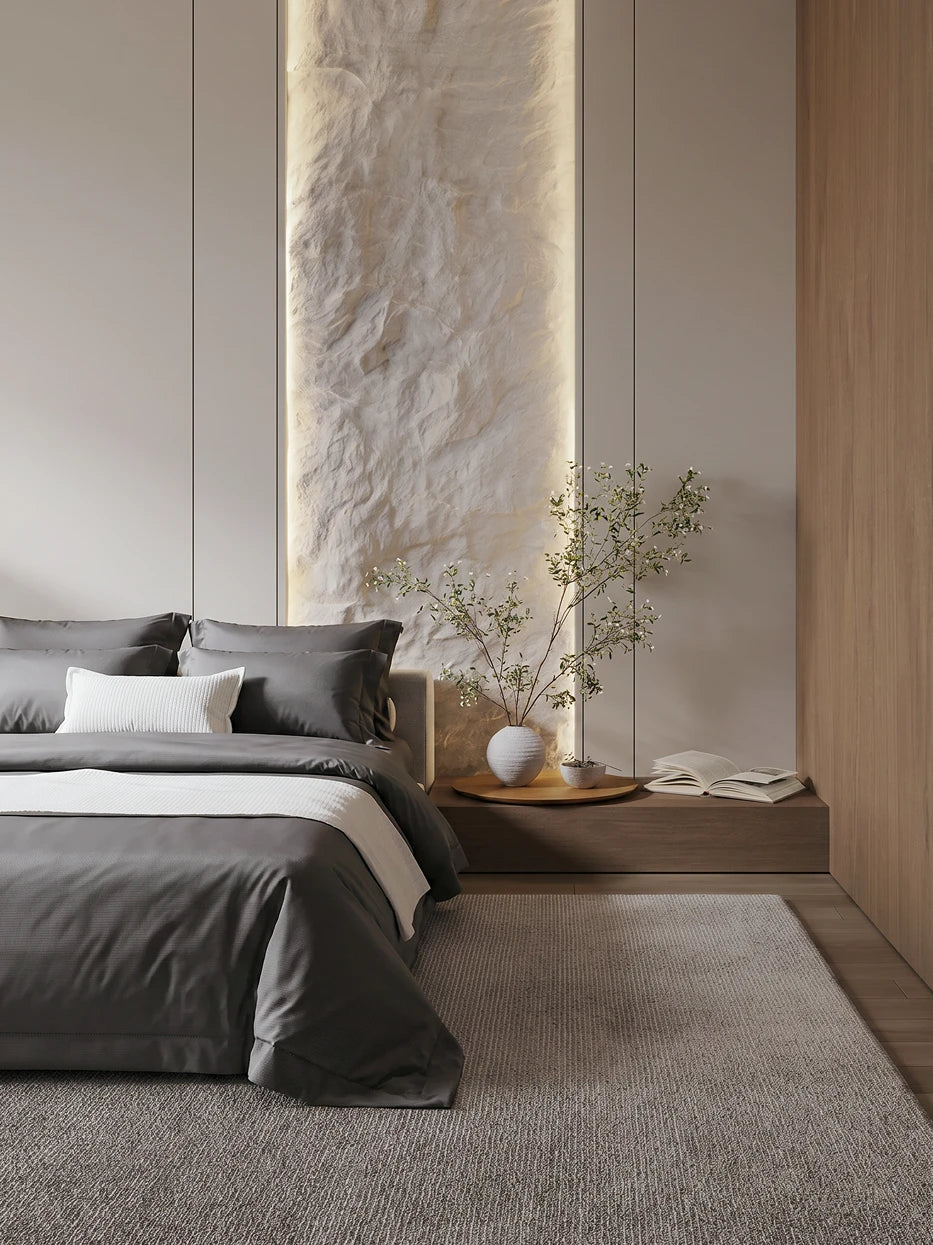 Minimalist stone & wood bedroom furnishing full view shot of YALIAN gray M-size bedding set beside natural stone feature wall & wooden nightstand